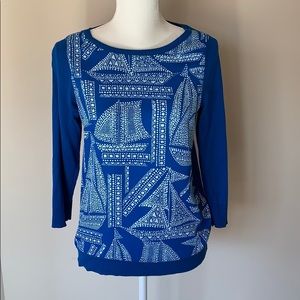 Blue and white sailboat sweater